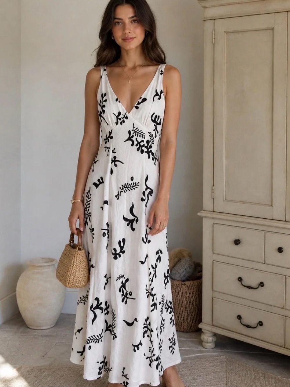 Sleeveless Ivory Maxi Dress with Black Botanical Print